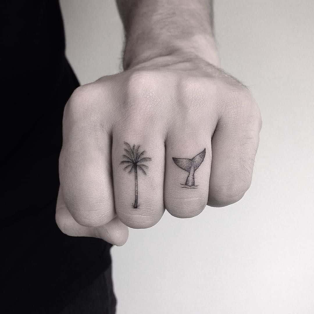 Palm tree and wave on finger  Tattoogridnet