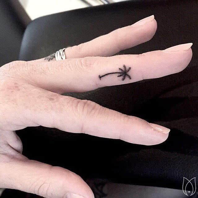 palm tree finger tattoo