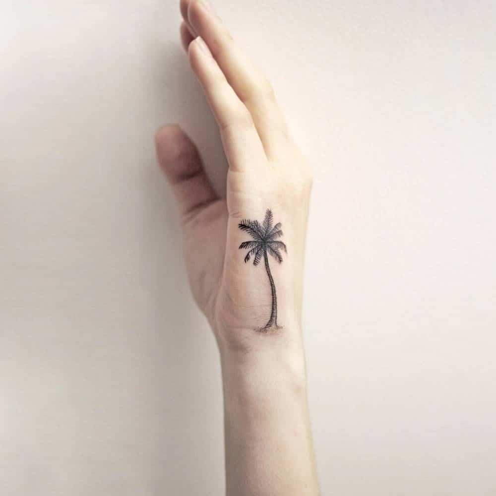 palm tree hand tattoo