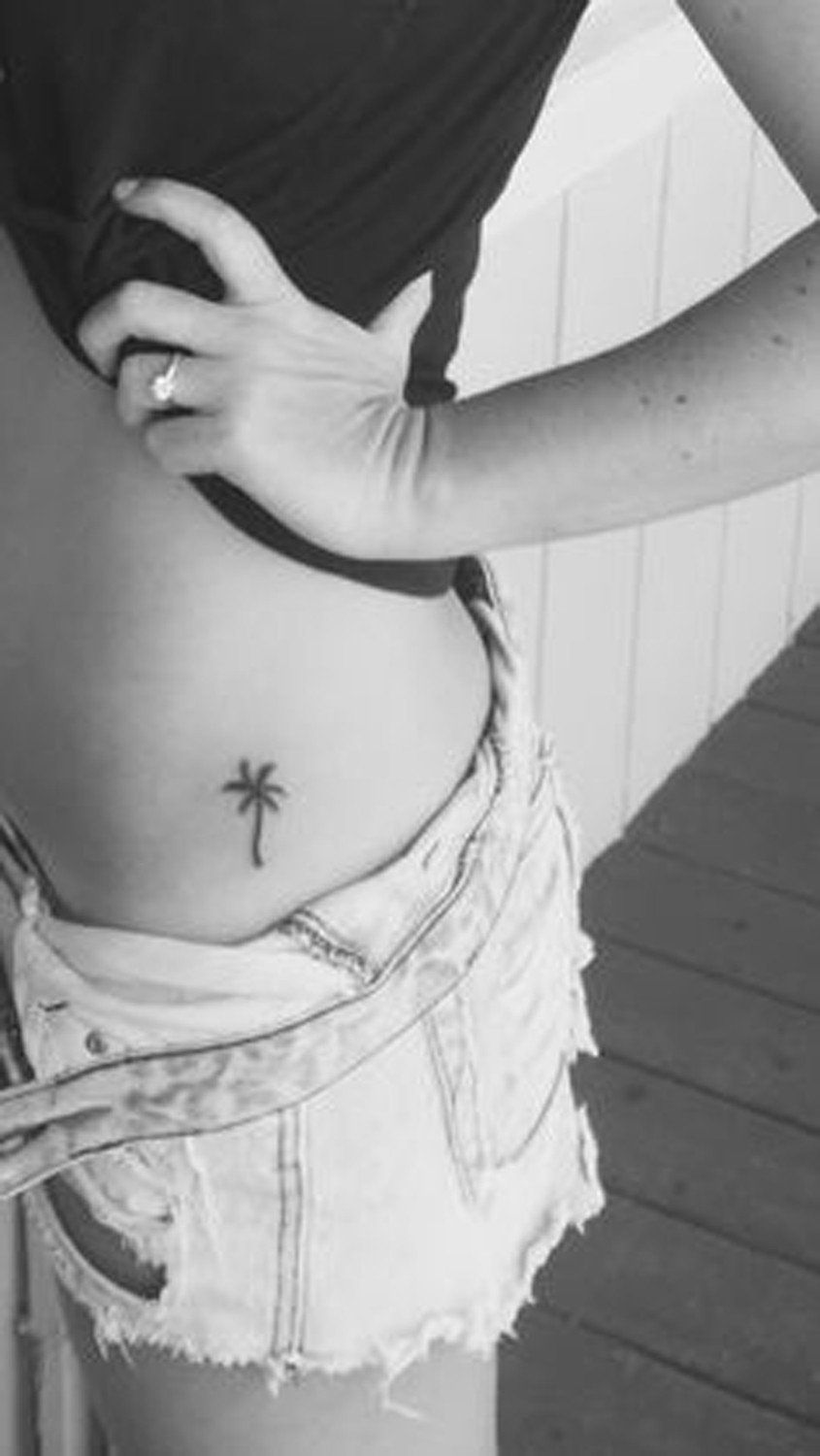 palm tree hip tattoo