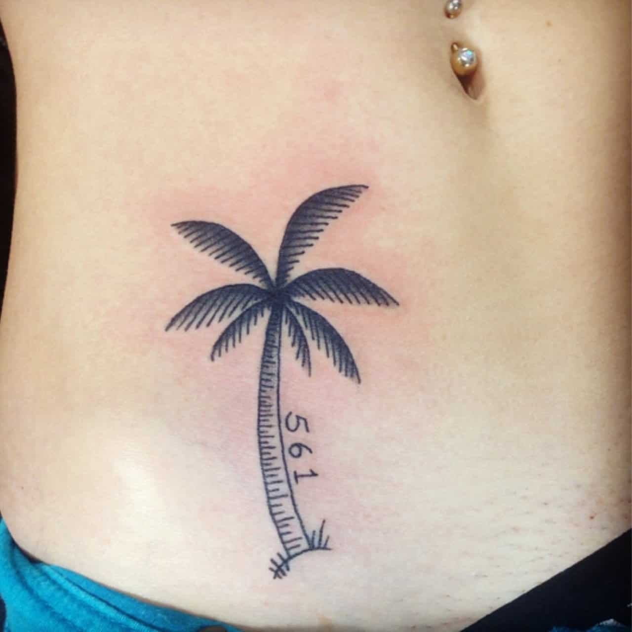 palm tree hip tattoo