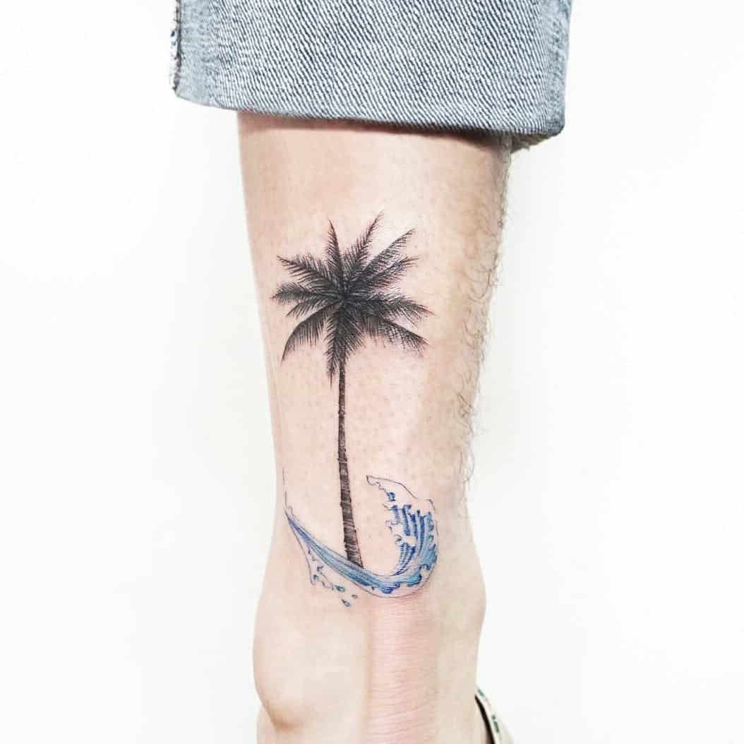 palm tree leg tattoo