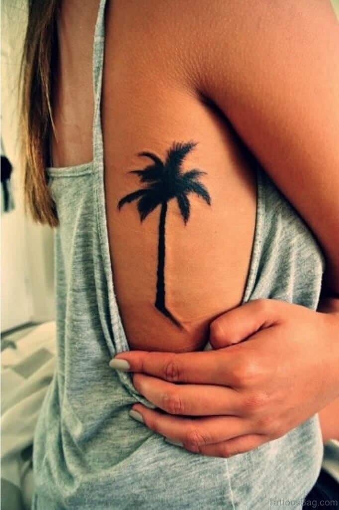 palm tree rib tattoo