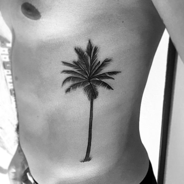palm tree rib tattoo