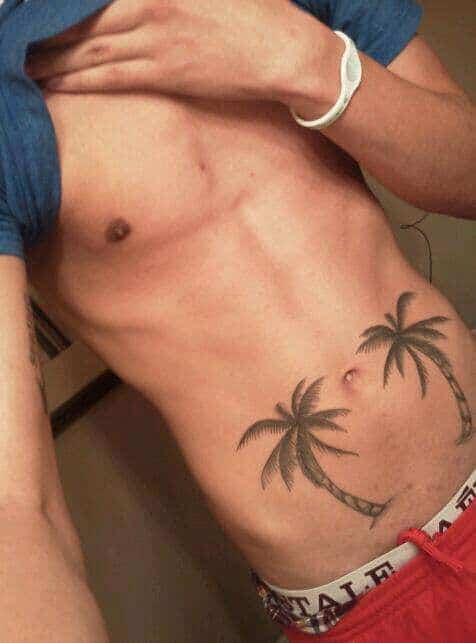 palm tree stomach tattoo