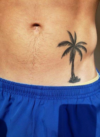 palm tree stomach tattoo