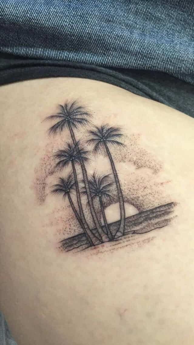 palm tree thigh tattoo