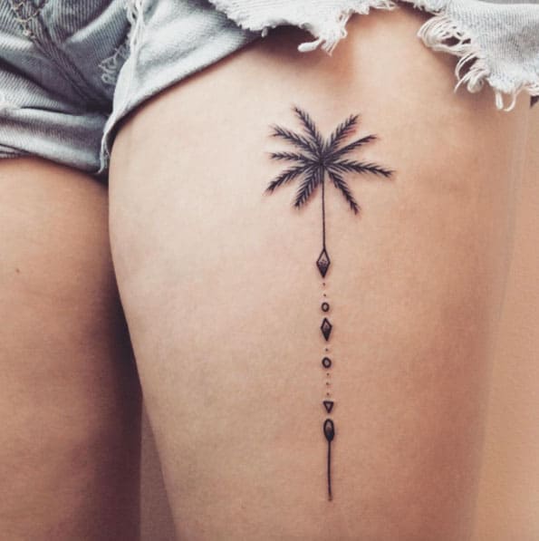 palm tree thigh tattoo