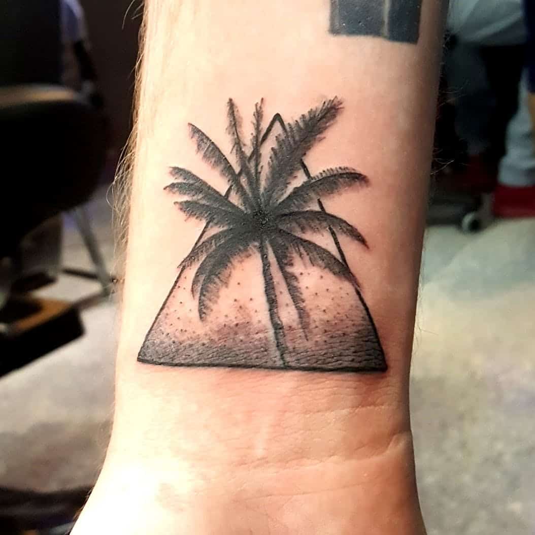 palm tree wrist tattoo