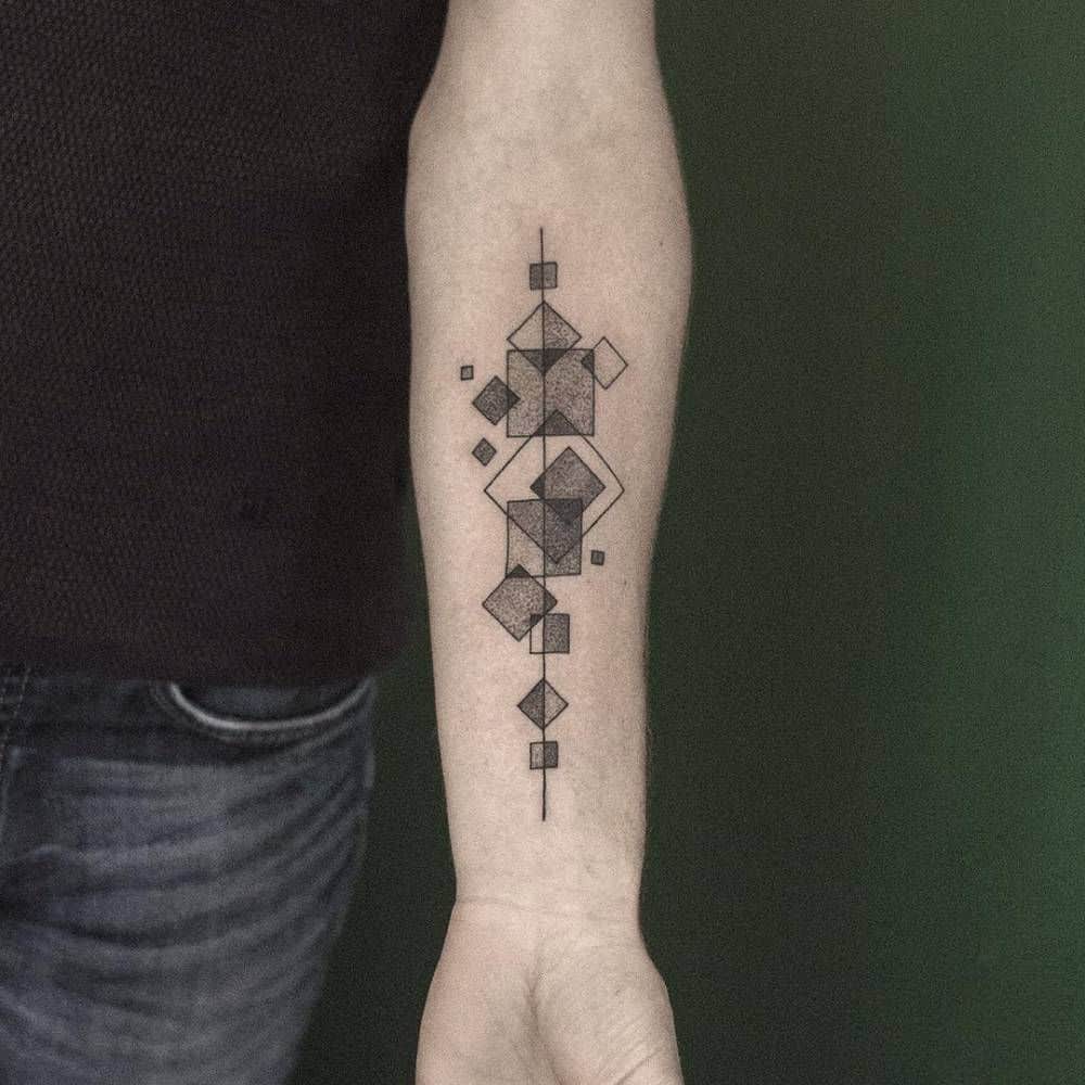 pointillism arm tattoo