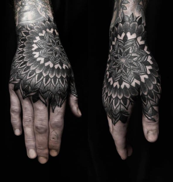 pointillism hand tattoo