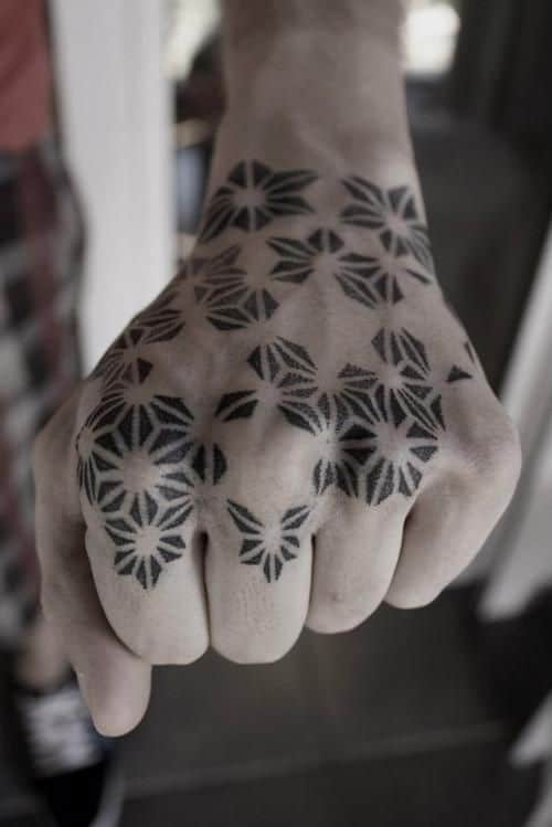 pointillism tattoo on hand