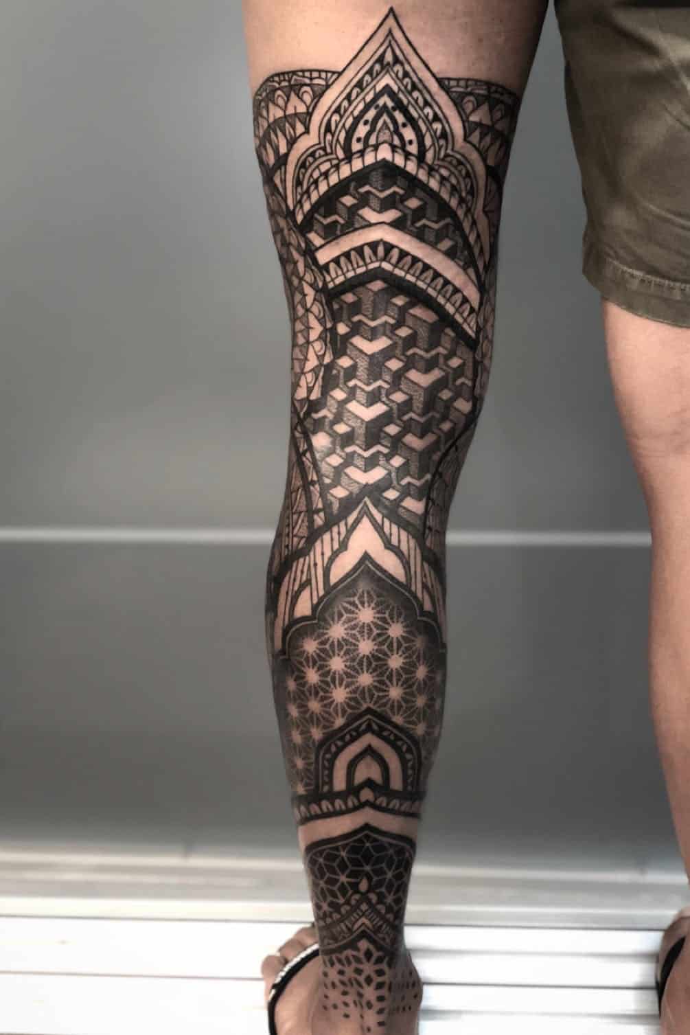 pointillism leg tattoo