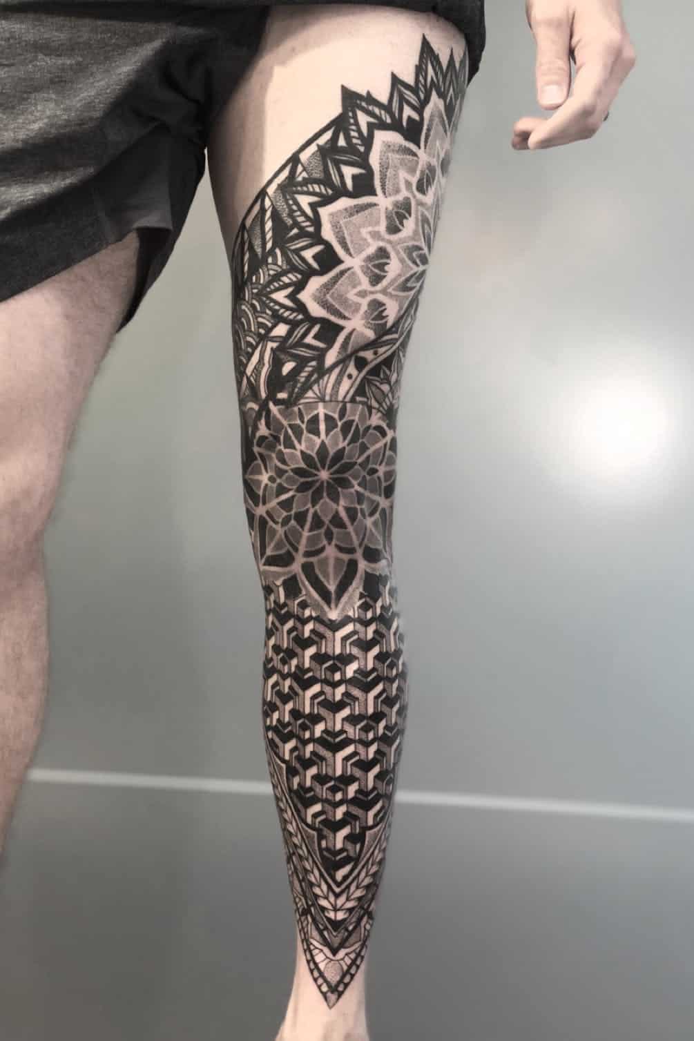 pointillism tattoo on leg