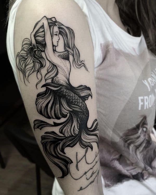sailor jerry mermaid tattoo on arm