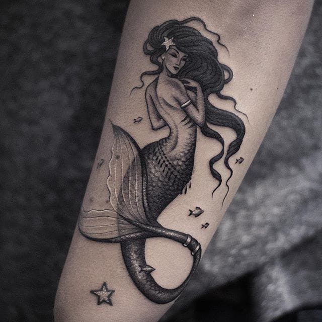 sailor jerry mermaid tattoo on arm