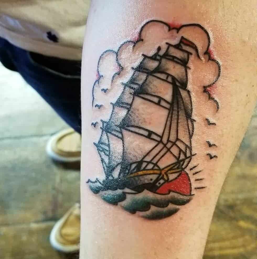 sailor jerry ship tattoo on arm