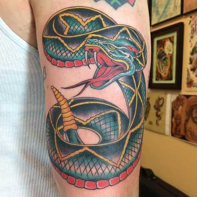 sailor jerry snake tattoo on arm