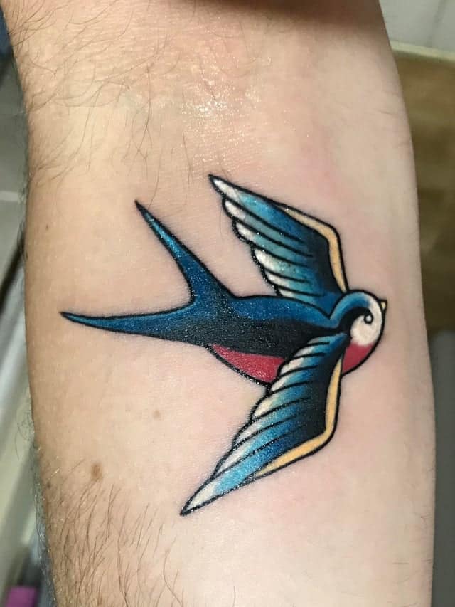 sailor jerry sparrow tattoo on arm