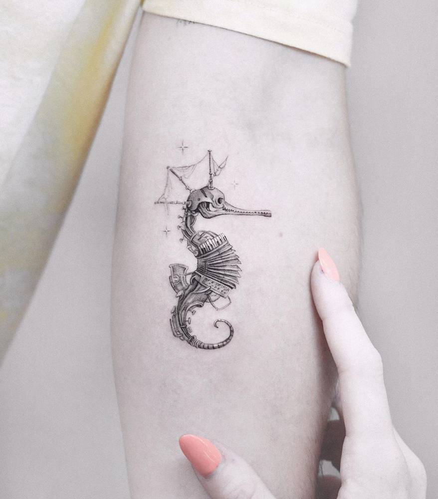 seahorse tattoo on arm