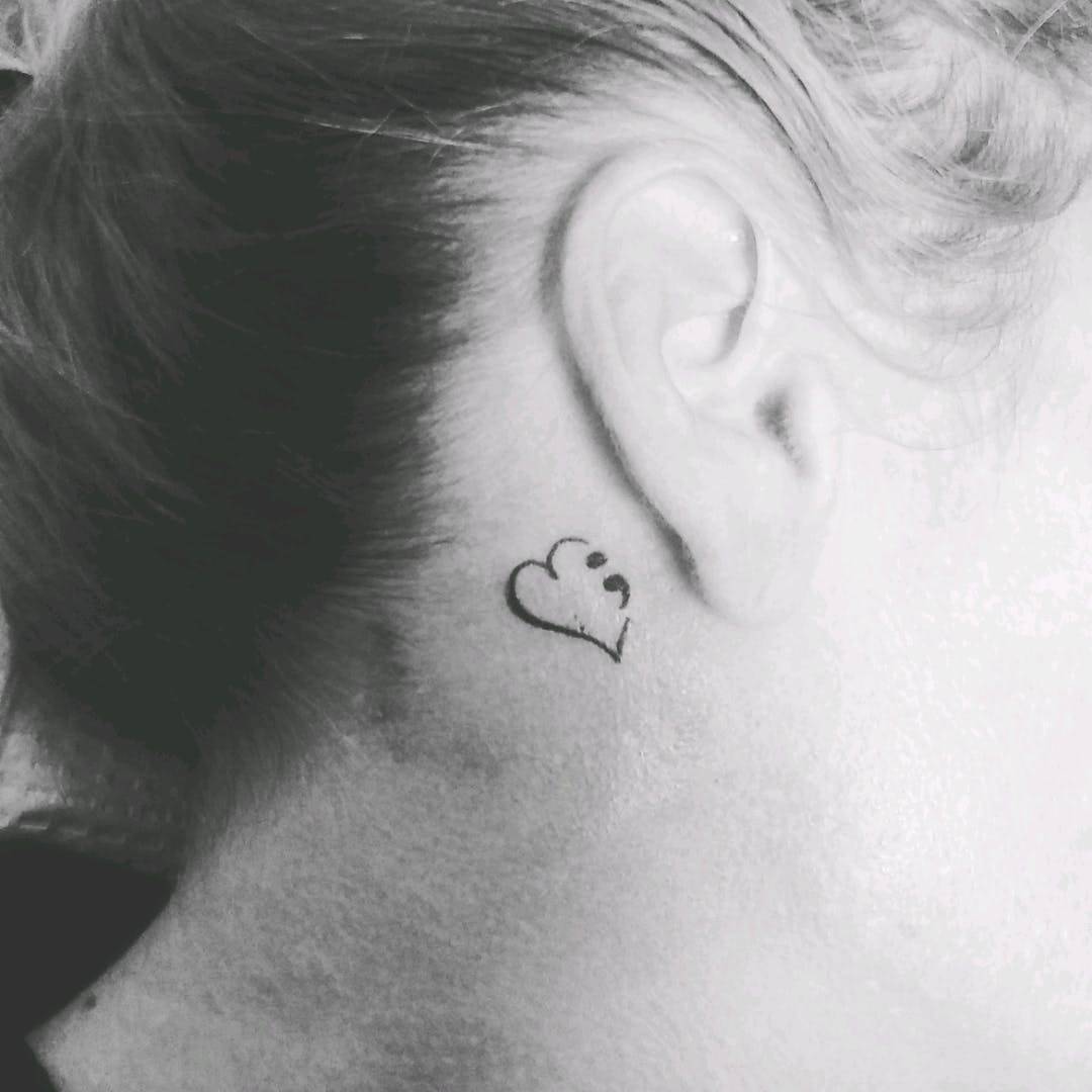 semicolon ear tattoo