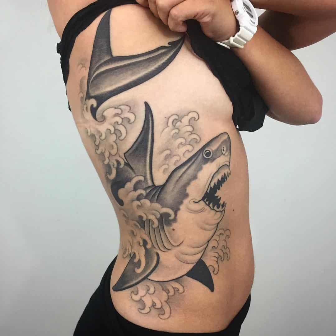 shark tattoo on rib