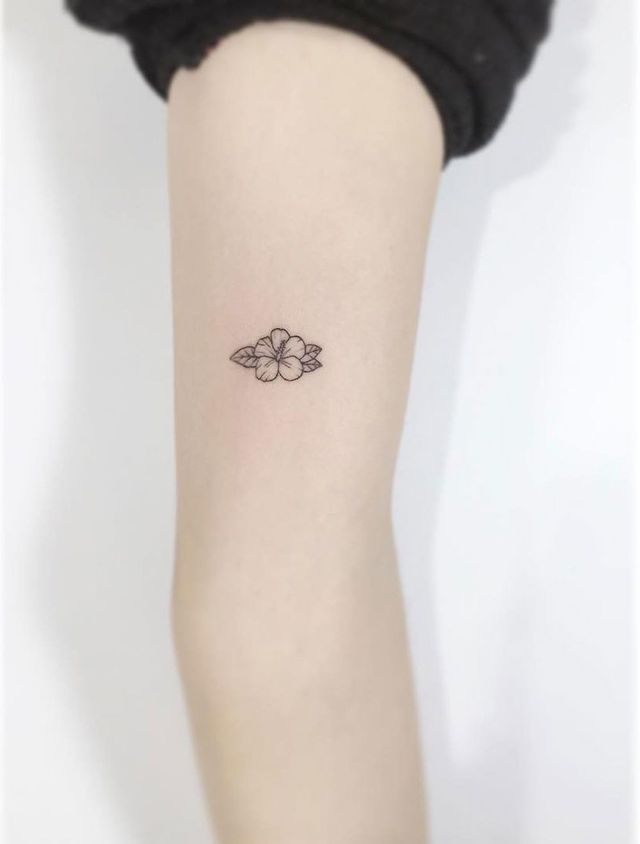 small hibiscus tattoo