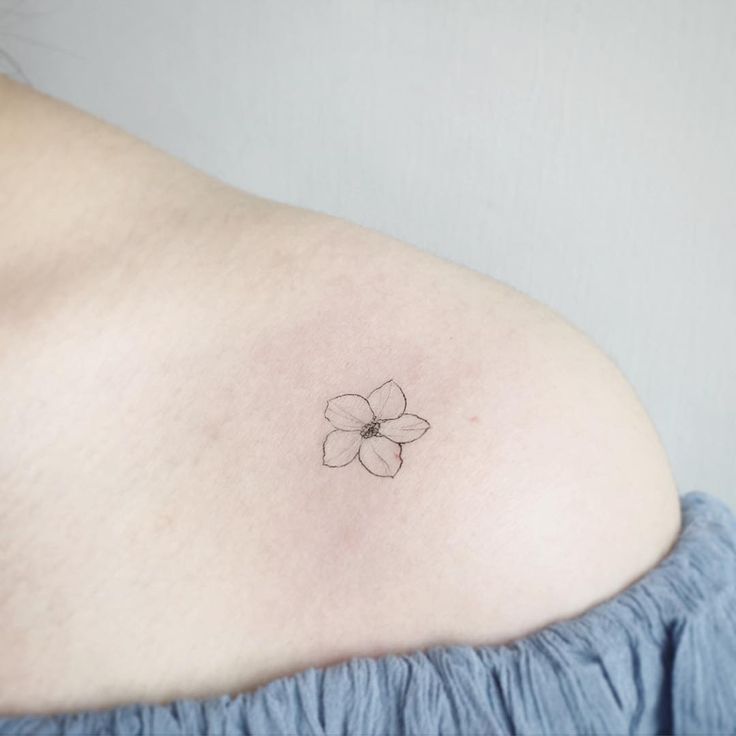 Beautiful and simple flower on the arm  Tattoogridnet