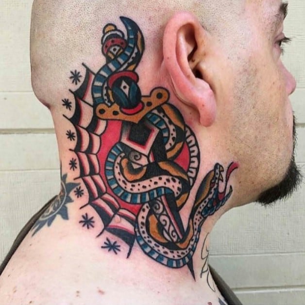 snake and dagger tattoo on neck