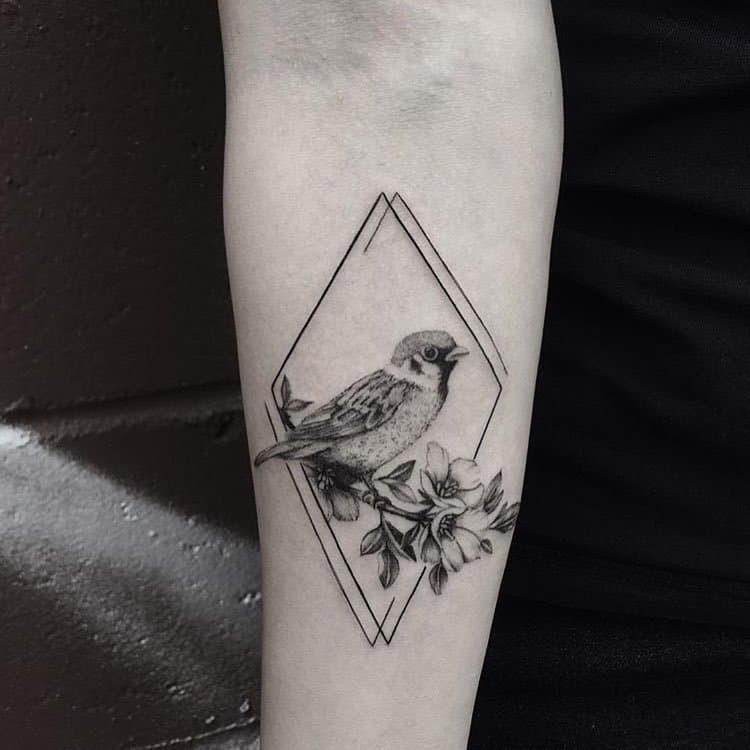 sparrow arm tattoo