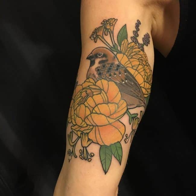 sparrow tattoo on arm