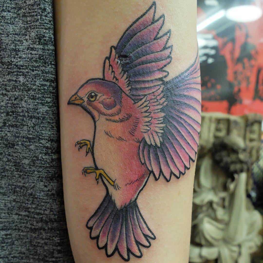 sparrow arm tattoo