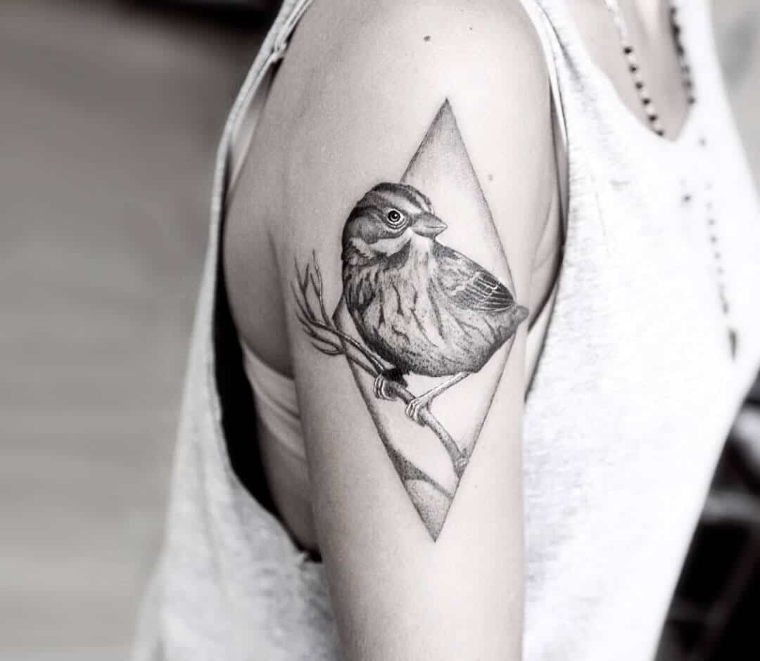 sparrow tattoo on arm