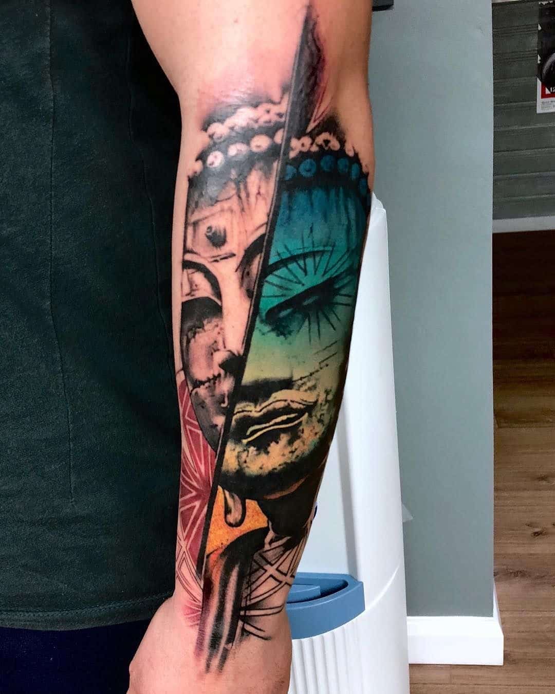 surrealism arm tattoo