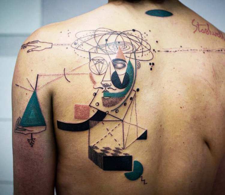 surrealism tattoo on back