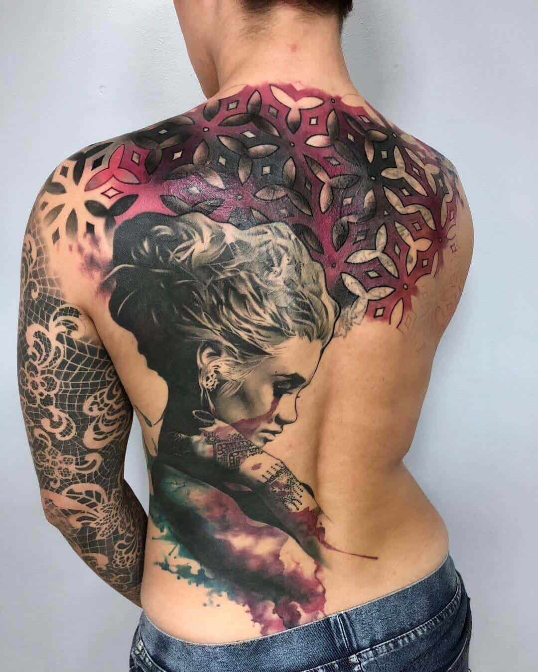 surrealism back tattoo