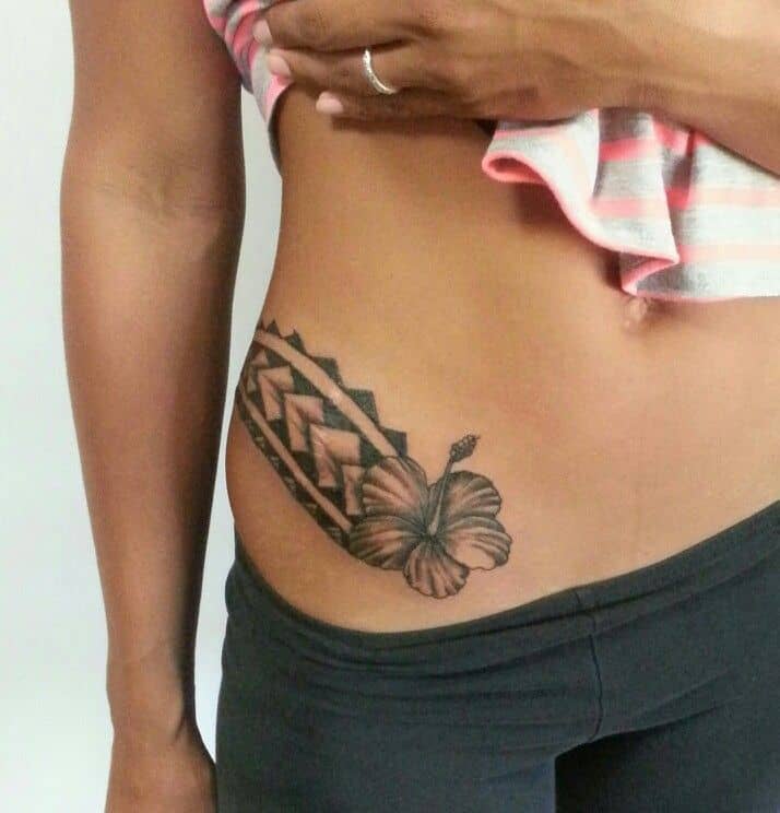 tribal hibiscus tattoo