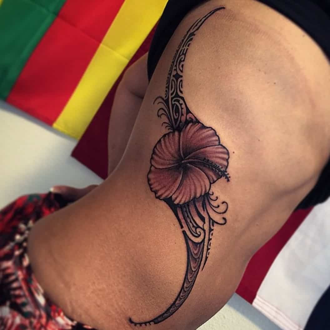 tribal hibiscus tattoo