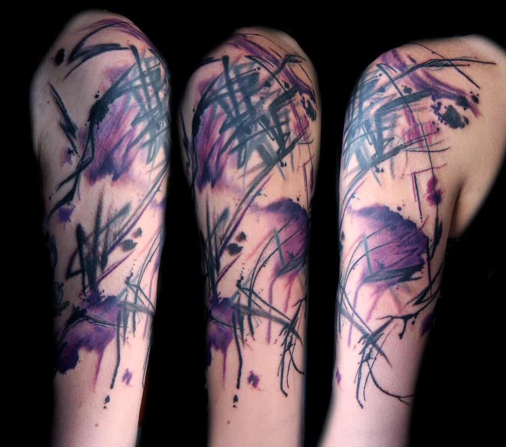 watercolor tattoo on arm