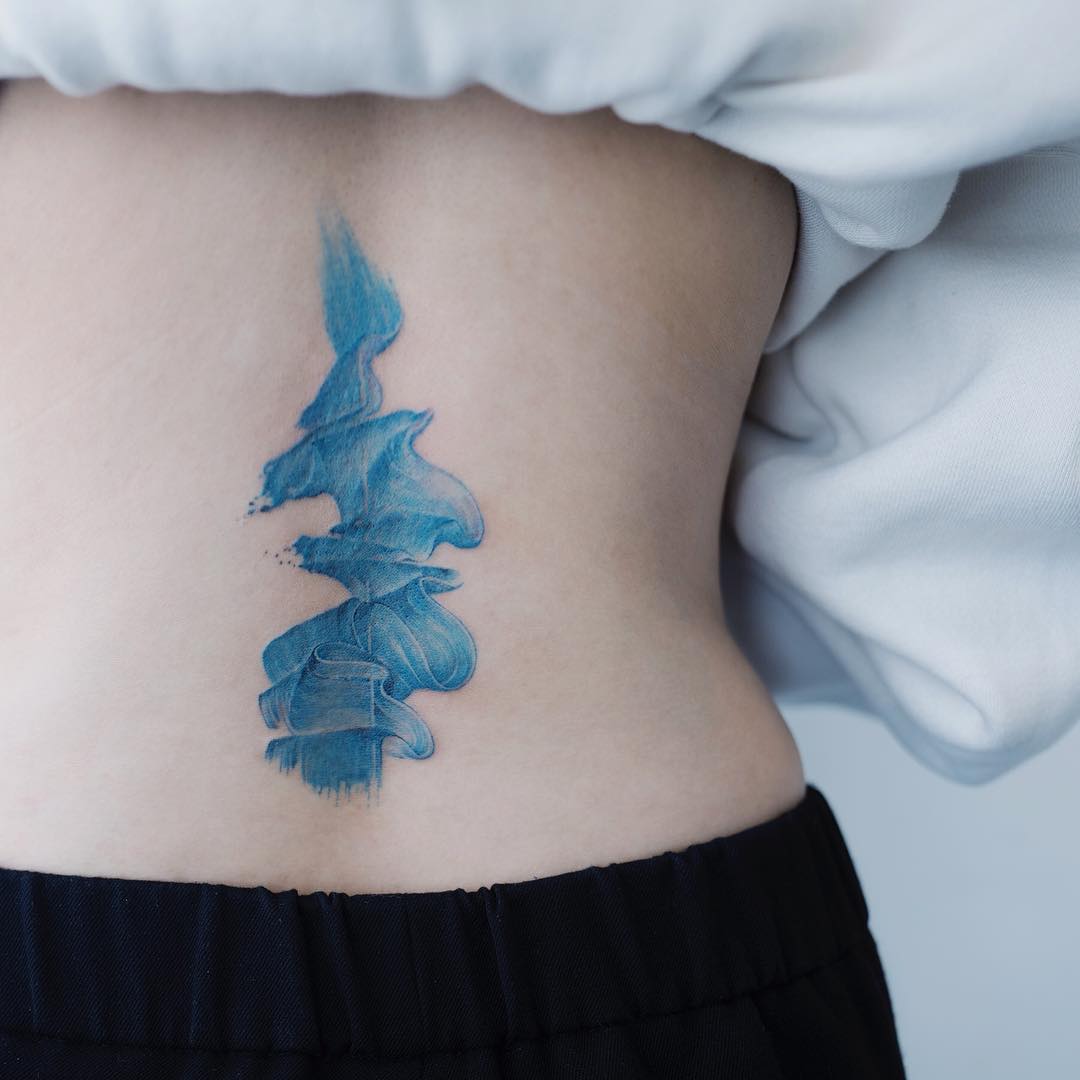 watercolor back tattoo