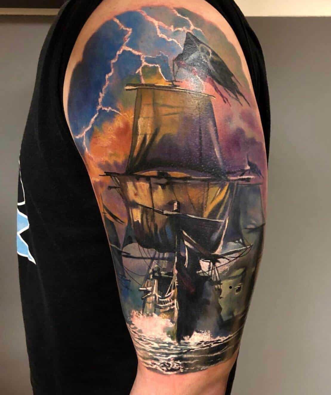watercolor boat tattoo on arm