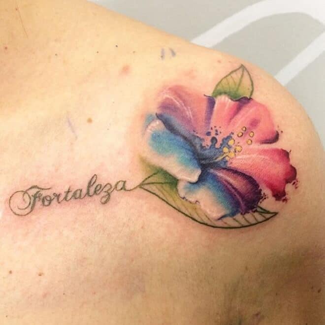 watercolor hibiscus tattoo on shoulder