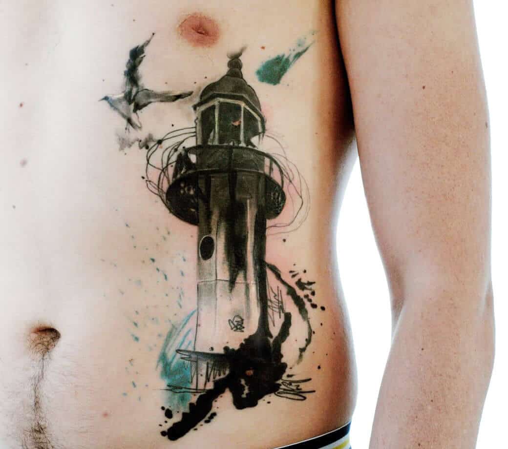 tatouage de phare en aquarelle