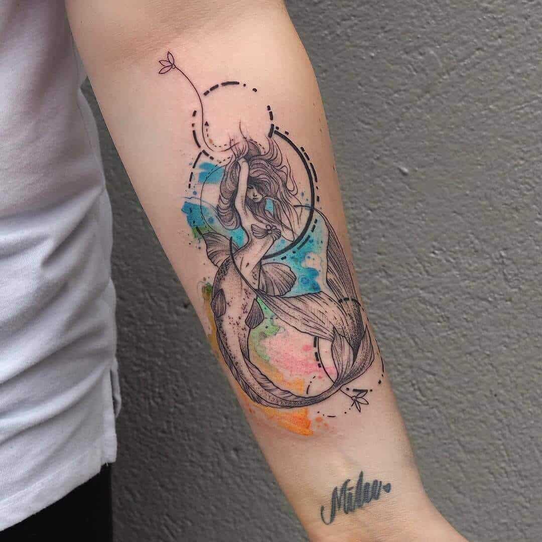 watercolor mermaid tattoo on arm