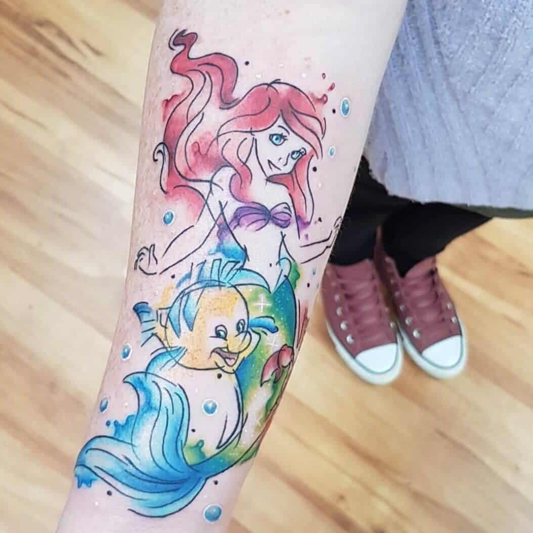 tatuaggio sirena acquerello su braccio