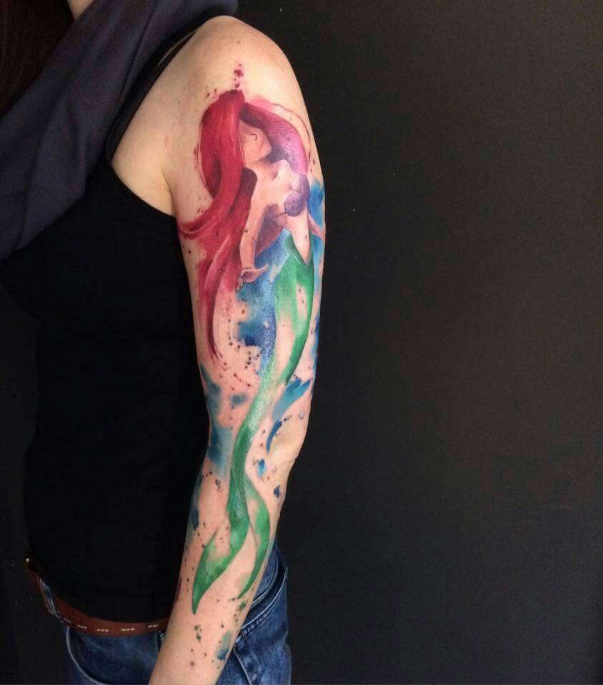 watercolor mermaid tattoo on arm