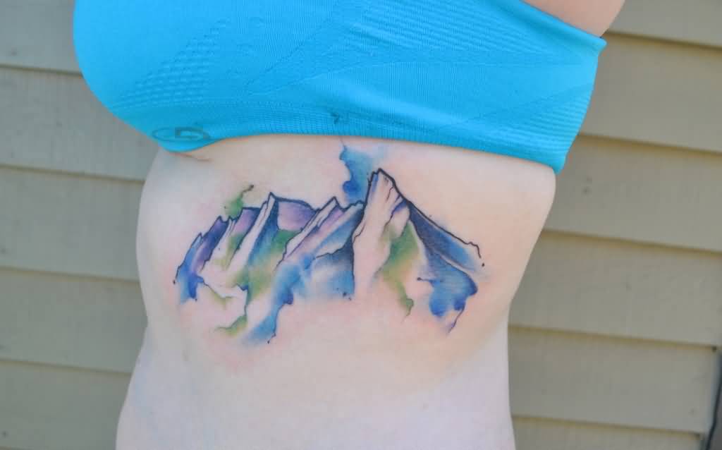 watercolor mountain tattoo