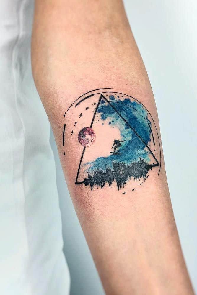 watercolor ocean tattoo on arm