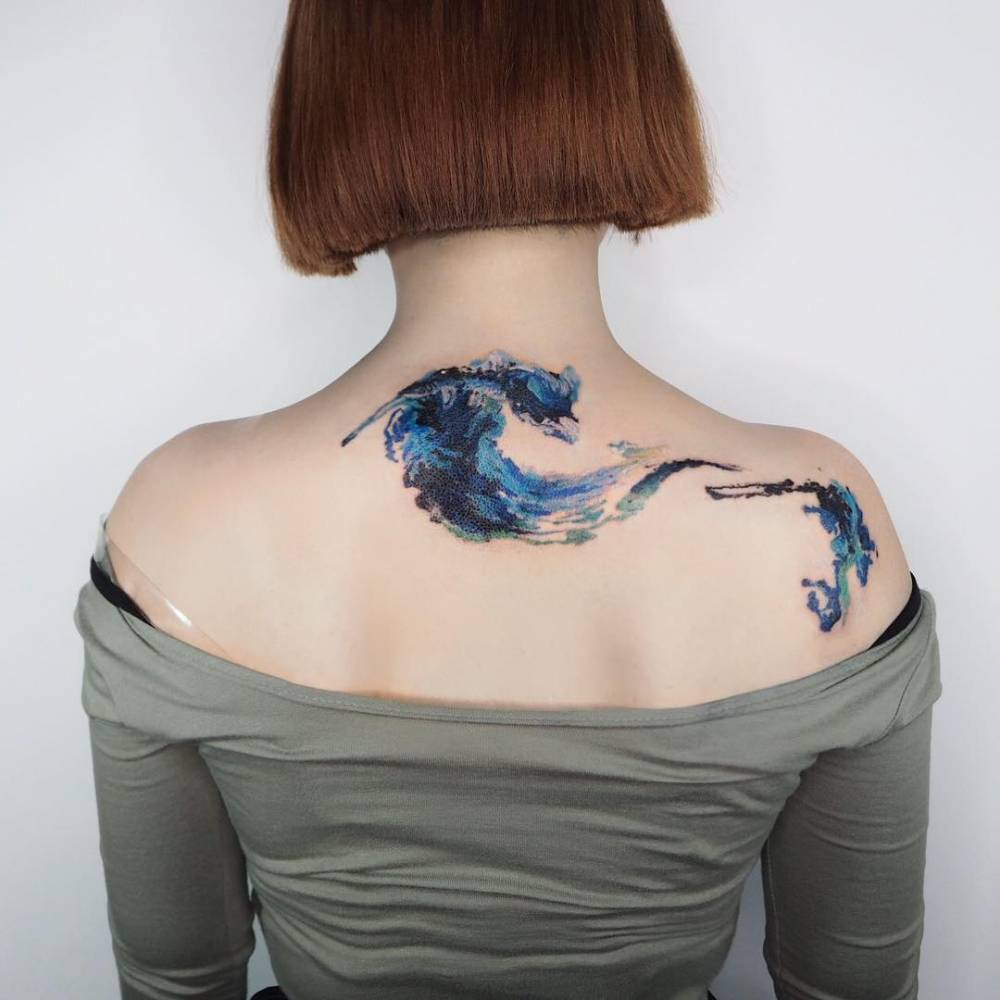 watercolor ocean tattoo on back