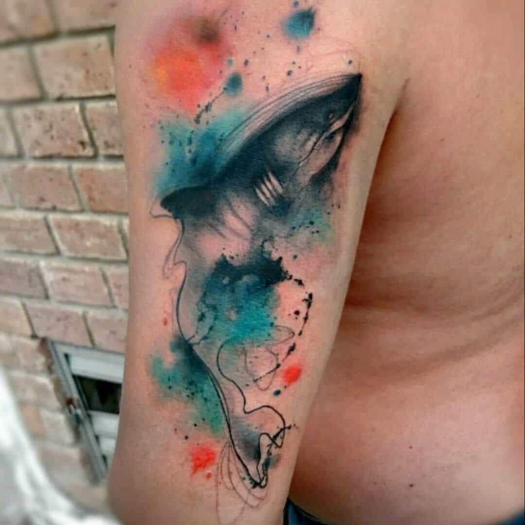 watercolor shark tattoo on arm